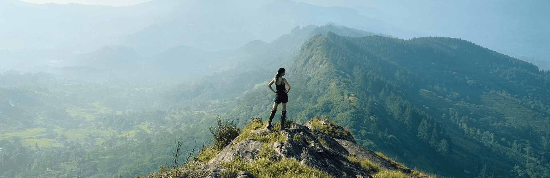 Panoramic wide-angle view of the rugged Hanthana mountain ridges and the lush valley surrounding Dendrobium House, Kandy.